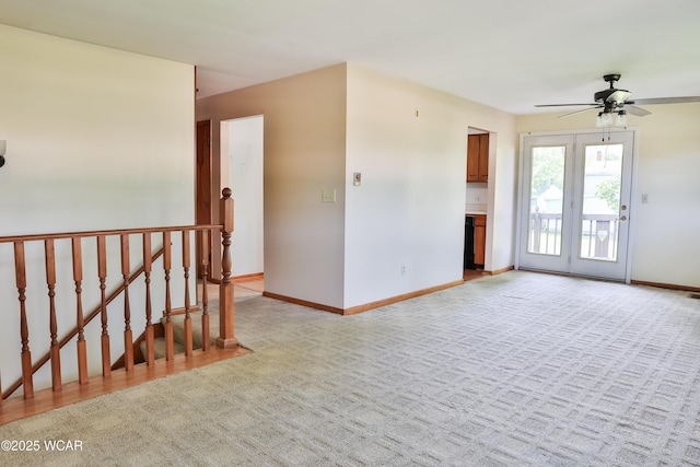 4940 Stewart Rd, Lima, OH 45801 - unfurnished room with a ceiling fan, light colored carpet, and baseboards