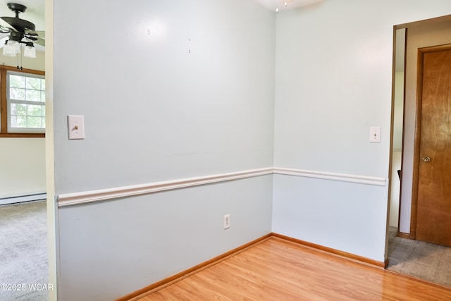 4940 Stewart Rd, Lima, OH 45801 - spare room with ceiling fan, wood finished floors, and baseboards