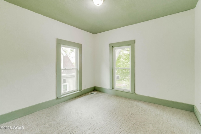 1157 W High St, Lima, OH 45805 - unfurnished room featuring carpet floors