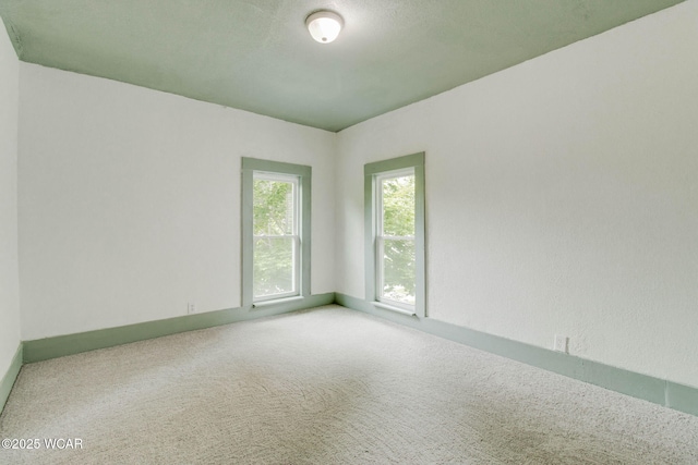 1157 W High St, Lima, OH 45805 - spare room with carpet and baseboards