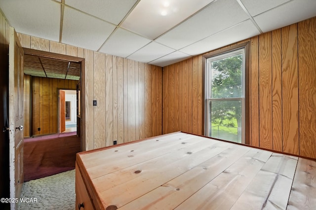 100 W S St, Columbus Grove, OH 45830 - unfurnished room featuring a paneled ceiling and wooden walls