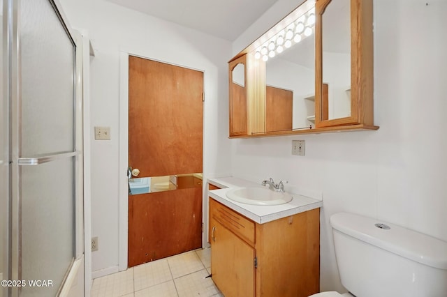 100 W S St, Columbus Grove, OH 45830 - full bathroom featuring an enclosed shower, toilet, vanity, and tile patterned floors