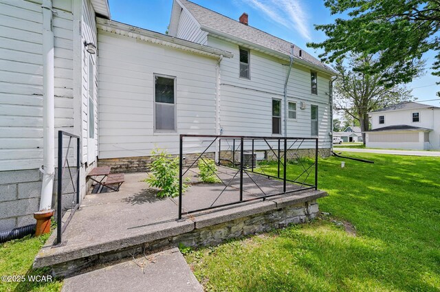 100 W S St, Columbus Grove, OH 45830 - rear view of house with a yard