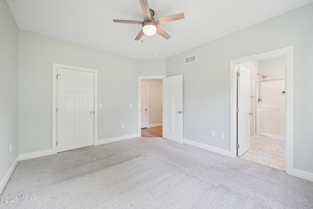 6856 Creekview Ct, Huntsville, OH 43324 - kitchen with light stone counters, decorative backsplash, light wood-style flooring, appliances with stainless steel finishes, and white cabinets