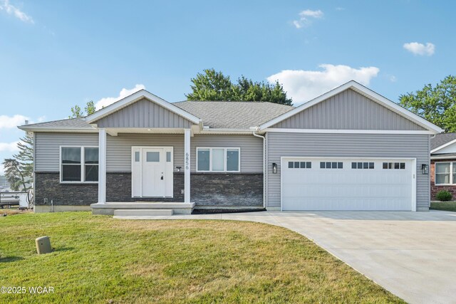 6856 Creekview Ct, Huntsville, OH 43324 - kitchen featuring a sink, stainless steel appliances, backsplash, and a center island