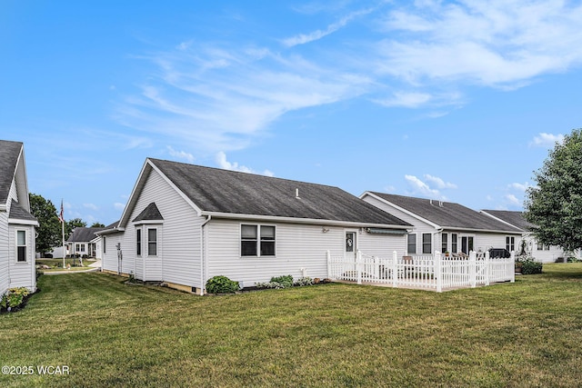 354 Stone Hedge Ln, Kenton, OH 43326 - rear view of property featuring a yard and roof with shingles