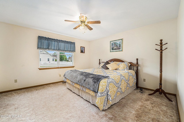 354 Stone Hedge Ln, Kenton, OH 43326 - carpeted bedroom with baseboards and a ceiling fan
