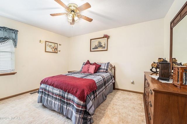 354 Stone Hedge Ln, Kenton, OH 43326 - bedroom with light colored carpet and ceiling fan
