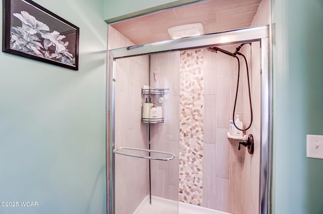 bathroom with an enclosed shower