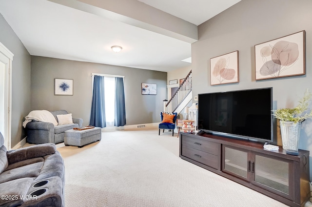 living room featuring carpet floors