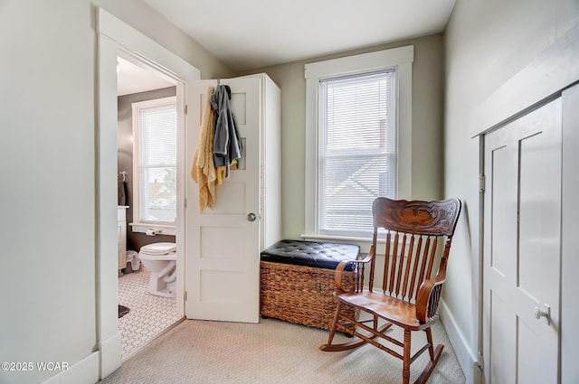 mudroom with light carpet