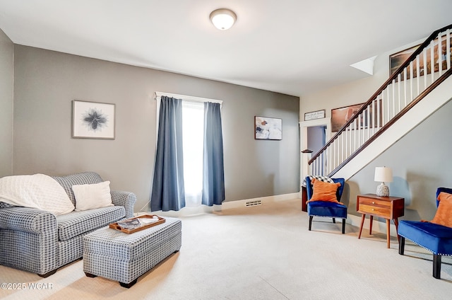 living room featuring light colored carpet