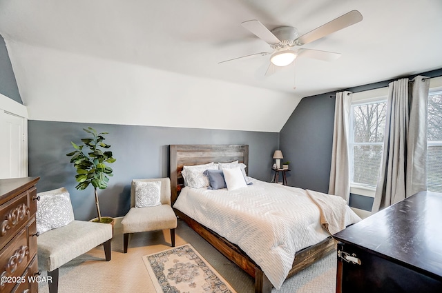 bedroom featuring vaulted ceiling and ceiling fan