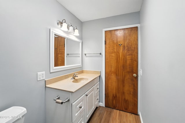 2170 E Hanthorn Rd, Lima, OH 45804 - bathroom featuring vanity and wood finished floors