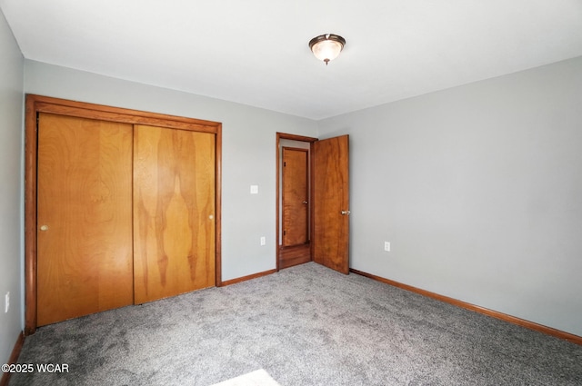 2170 E Hanthorn Rd, Lima, OH 45804 - unfurnished bedroom featuring carpet flooring and a closet