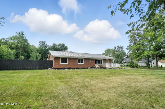 2170 E Hanthorn Rd, Lima, OH 45804 - rear view of property with brick siding, a metal roof, and a standing seam roof