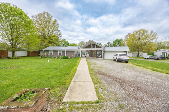 16949 Township Road 39, Belle Center, OH 43310 - mid-century inspired home featuring a front lawn, metal roof, and gravel driveway