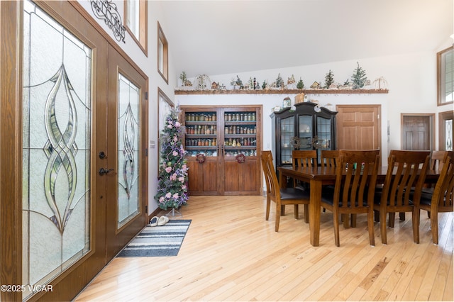 16949 Township Road 39, Belle Center, OH 43310 - entrance foyer featuring hardwood / wood-style flooring, healthy amount of natural light, and high vaulted ceiling