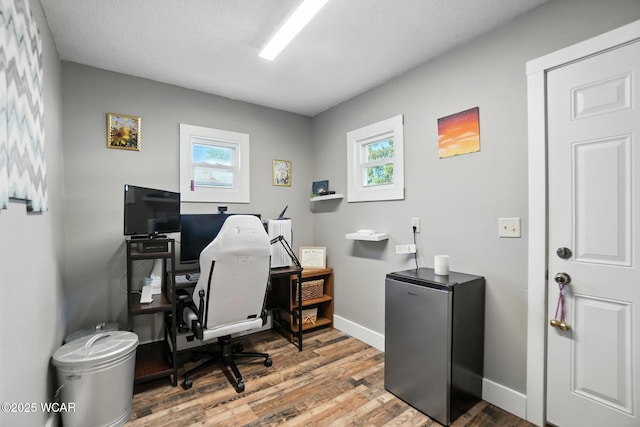 409 S Race St, Van Wert, OH 45891 - home office with healthy amount of natural light and wood finished floors