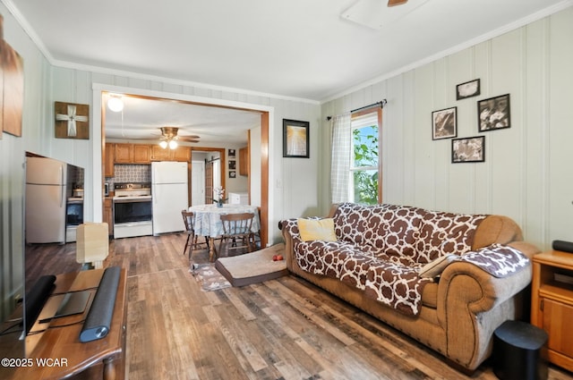 409 S Race St, Van Wert, OH 45891 - living area featuring crown molding, ceiling fan, and wood finished floors