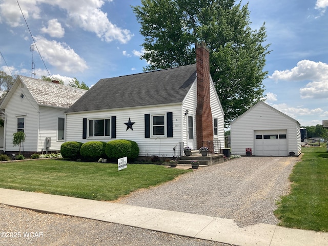 110 E Pearl St, Beaverdam, OH 45808 - cape cod home featuring an outdoor structure, a chimney, a detached garage, a shingled roof, and a front lawn