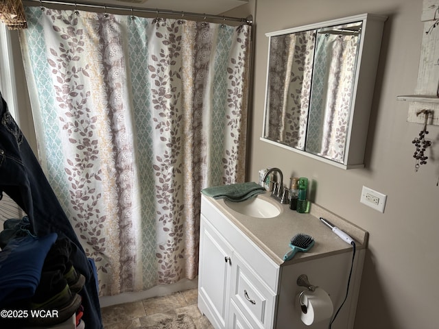 110 E Pearl St, Beaverdam, OH 45808 - full bath featuring a shower with curtain, vanity, and stone finish flooring