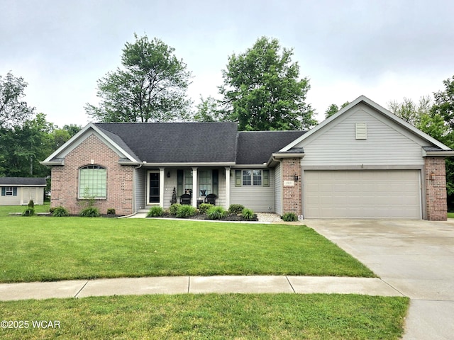 1919 Jared Pl, Lima, OH 45805 - ranch-style home with brick siding, covered porch, a garage, concrete driveway, and a front lawn