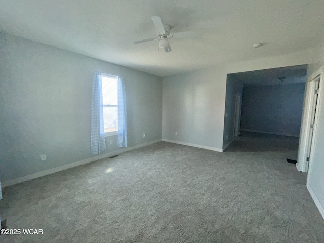 318 E E Vine St, Lima, OH 45804 - carpeted empty room with a ceiling fan and baseboards