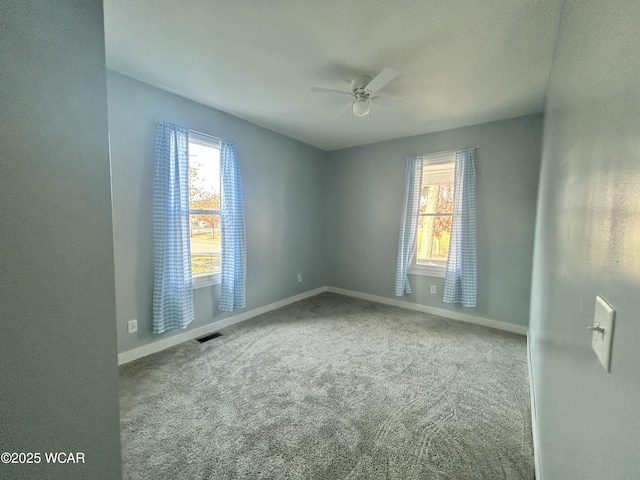 318 E E Vine St, Lima, OH 45804 - carpeted spare room featuring a ceiling fan and baseboards