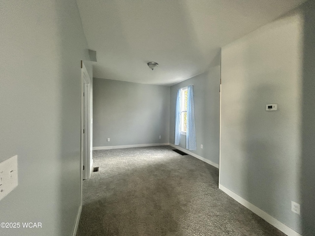 318 E E Vine St, Lima, OH 45804 - carpeted spare room featuring baseboards
