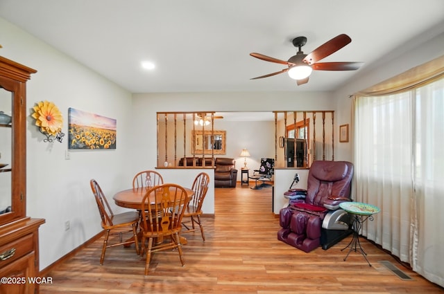 dining area with ceiling fan, recessed lighting, visible vents, and light wood-style floors
