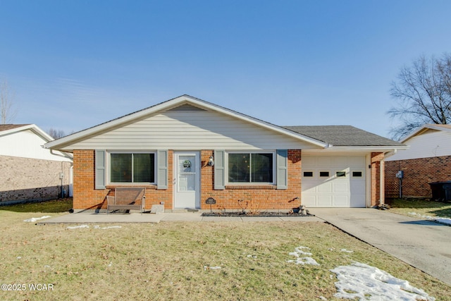 ranch-style home featuring a garage and a front lawn