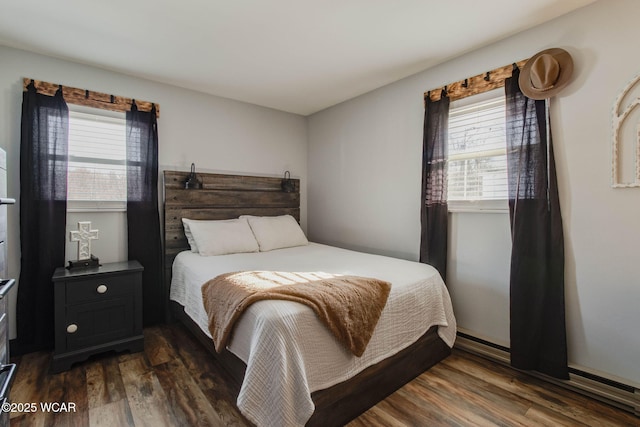 bedroom featuring dark wood-type flooring