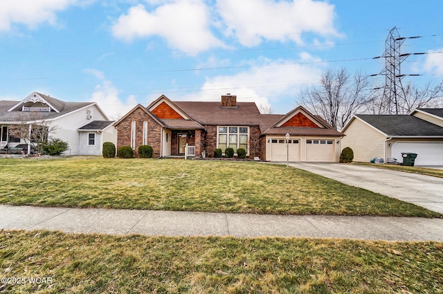 view of front of property featuring a garage and a front lawn