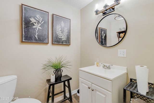 350 W Highland Ave, Ada, OH 45810 - bathroom featuring vanity and toilet