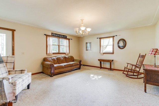 350 W Highland Ave, Ada, OH 45810 - living area featuring a chandelier, healthy amount of natural light, and carpet