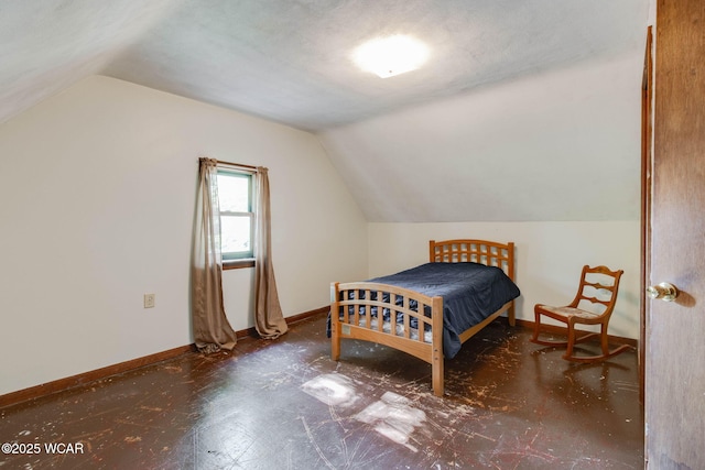 350 W Highland Ave, Ada, OH 45810 - bedroom featuring vaulted ceiling and baseboards