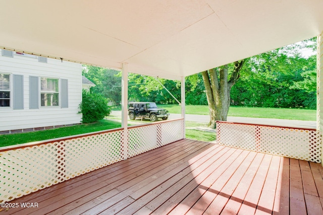 350 W Highland Ave, Ada, OH 45810 - wooden terrace featuring a yard and view of wooded area