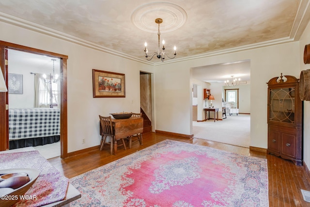 350 W Highland Ave, Ada, OH 45810 - living area with a chandelier and wood finished floors