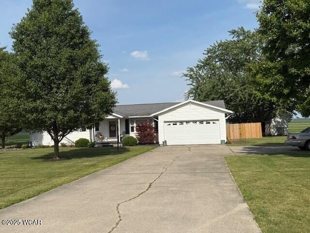 11309 Dull Robinson Rd, Van Wert, OH 45891 - view of front facade featuring a garage and concrete driveway