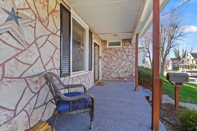 424 N Market St, Kenton, OH 43326 - view of patio featuring a porch