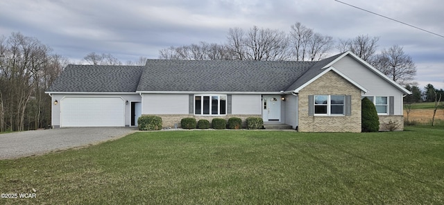 ranch-style home with a front lawn, aphalt driveway, brick siding, a shingled roof, and an attached garage