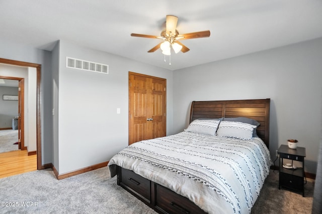 13286 Arrowhead Dr, Findlay, OH 45840 - carpeted bedroom with a ceiling fan and a closet