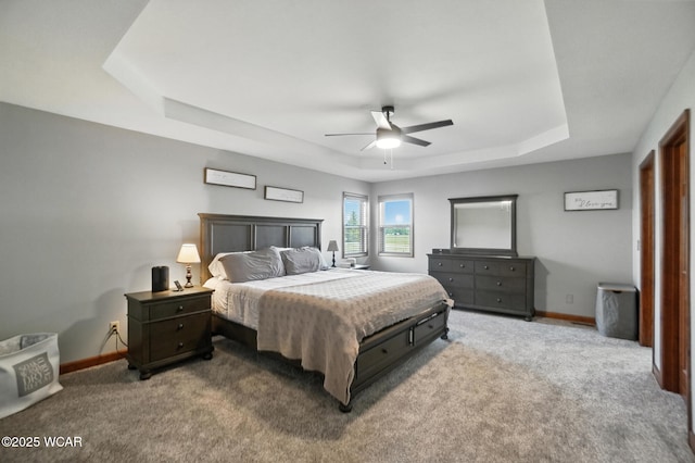 13286 Arrowhead Dr, Findlay, OH 45840 - bedroom featuring a raised ceiling, carpet, and ceiling fan