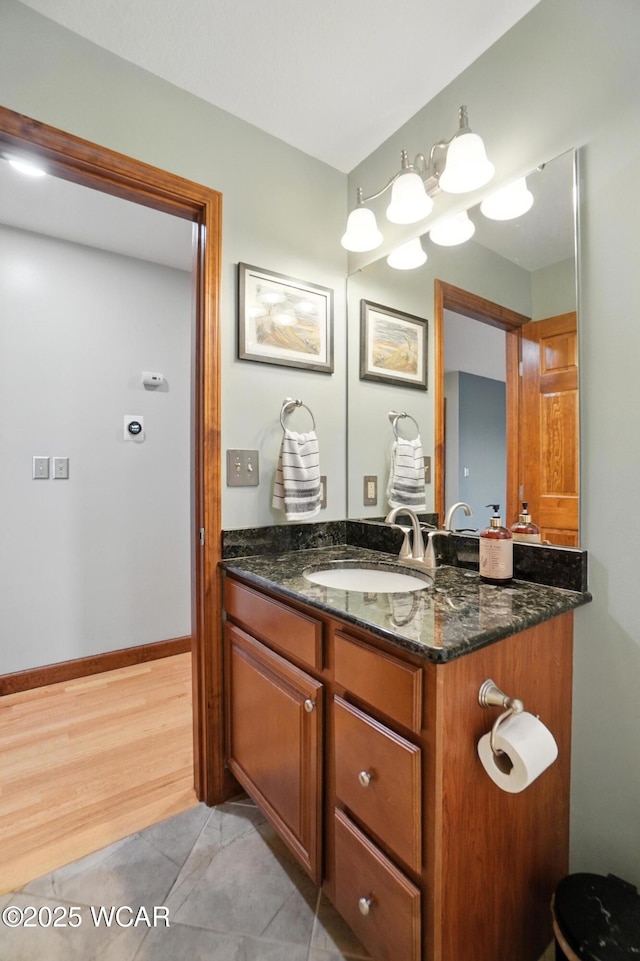 13286 Arrowhead Dr, Findlay, OH 45840 - bathroom with vanity and wood finished floors