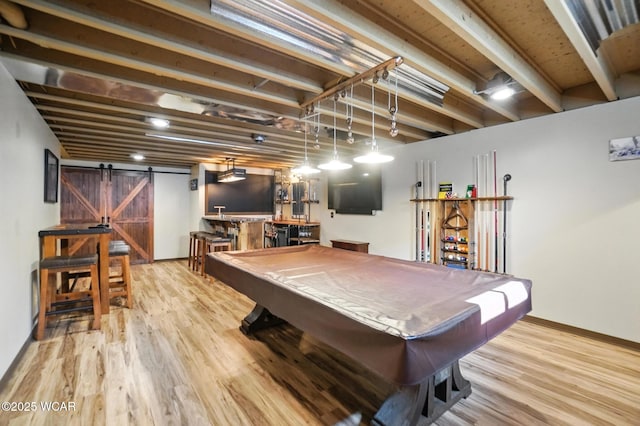 13286 Arrowhead Dr, Findlay, OH 45840 - rec room with a barn door, wood finished floors, and billiards table