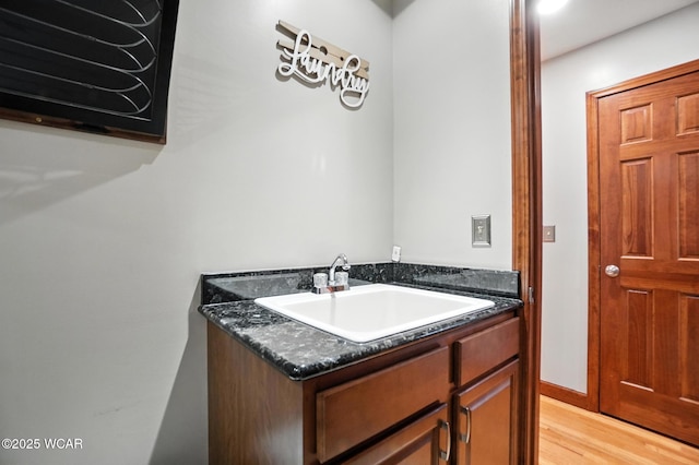 13286 Arrowhead Dr, Findlay, OH 45840 - bathroom with wood finished floors and vanity