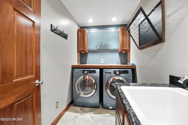 13286 Arrowhead Dr, Findlay, OH 45840 - washroom with washer and clothes dryer and cabinet space