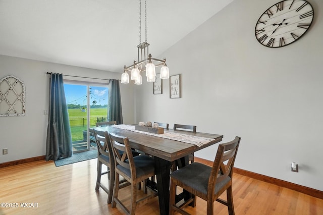 13286 Arrowhead Dr, Findlay, OH 45840 - dining area with light wood finished floors and vaulted ceiling