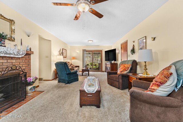 3540 Yoakam Rd, Lima, OH 45806 - living area featuring a ceiling fan, carpet, and a brick fireplace